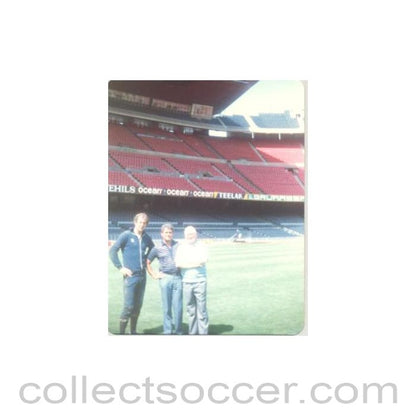 Photo of players and managers on a Stadium